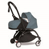 Adjustable central strap for optimal baby placement